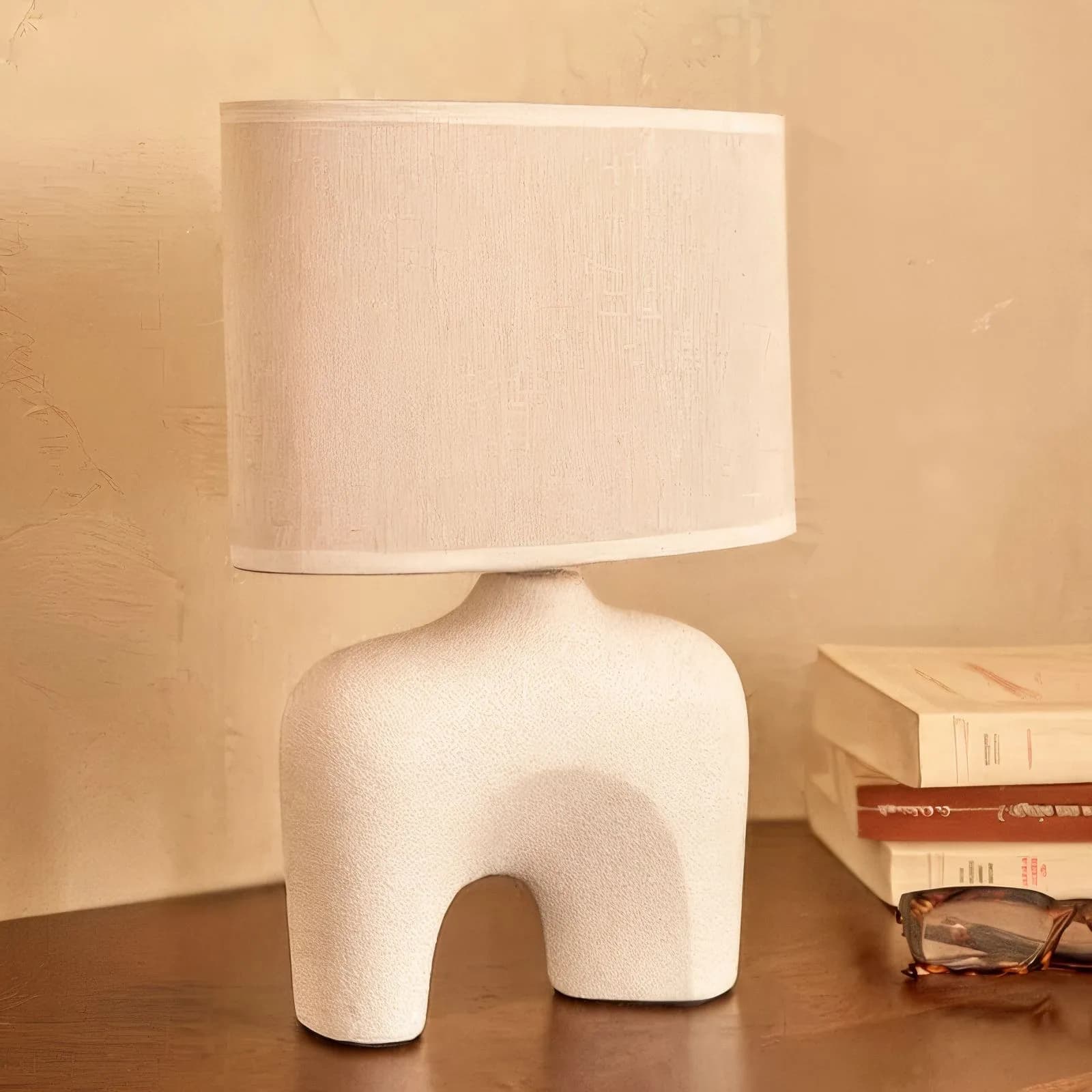 Lampada da tavolo 32h cm ovale in ceramica bianco effetto pietra