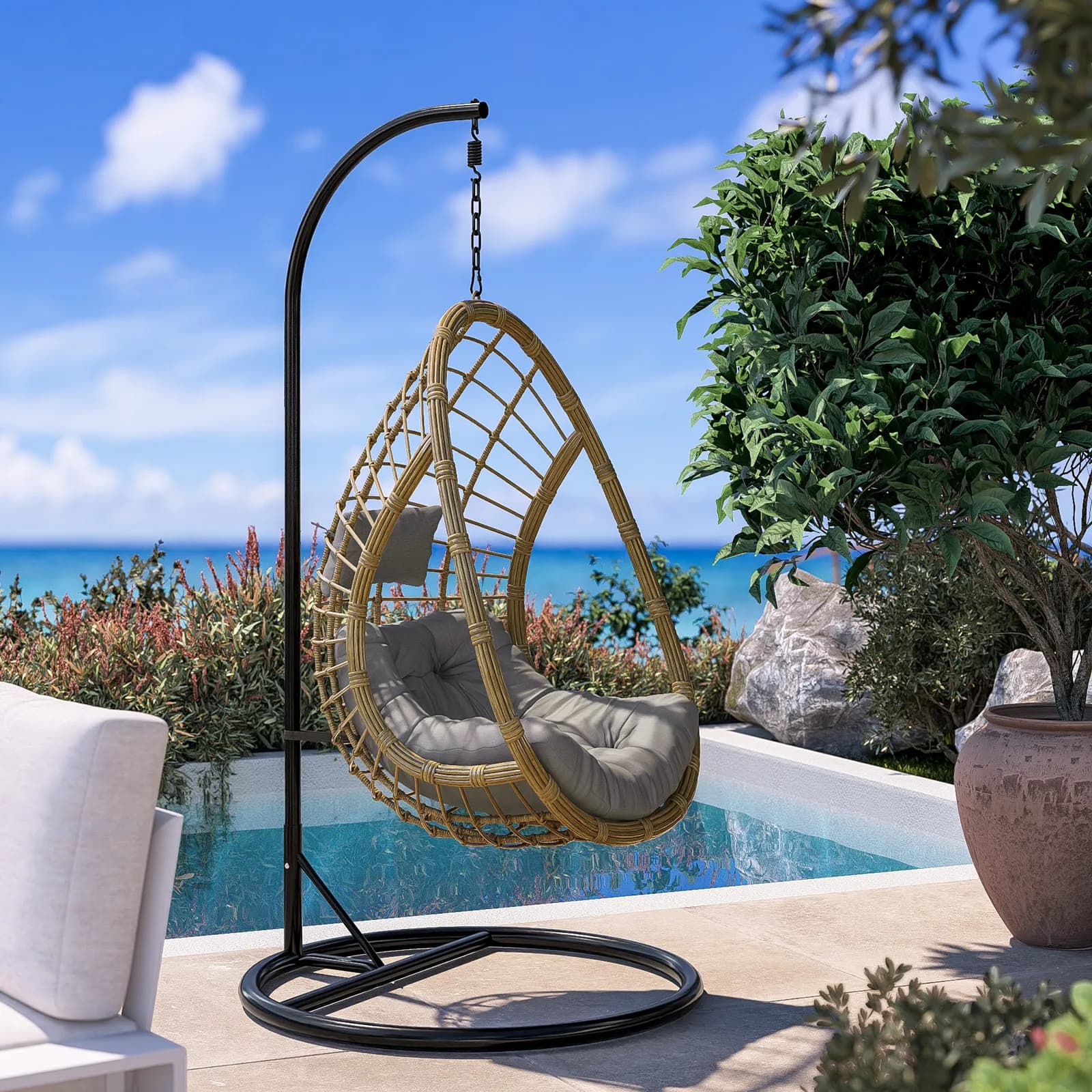 Poltrona sospesa in acciaio nero e polyrattan naturale con cuscino - Kasher