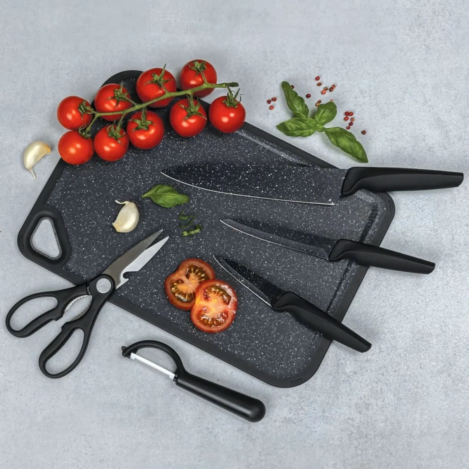 Set 6 utensili per la cucina in acciaio effetto pietra nero e polipropielene - Yasmira