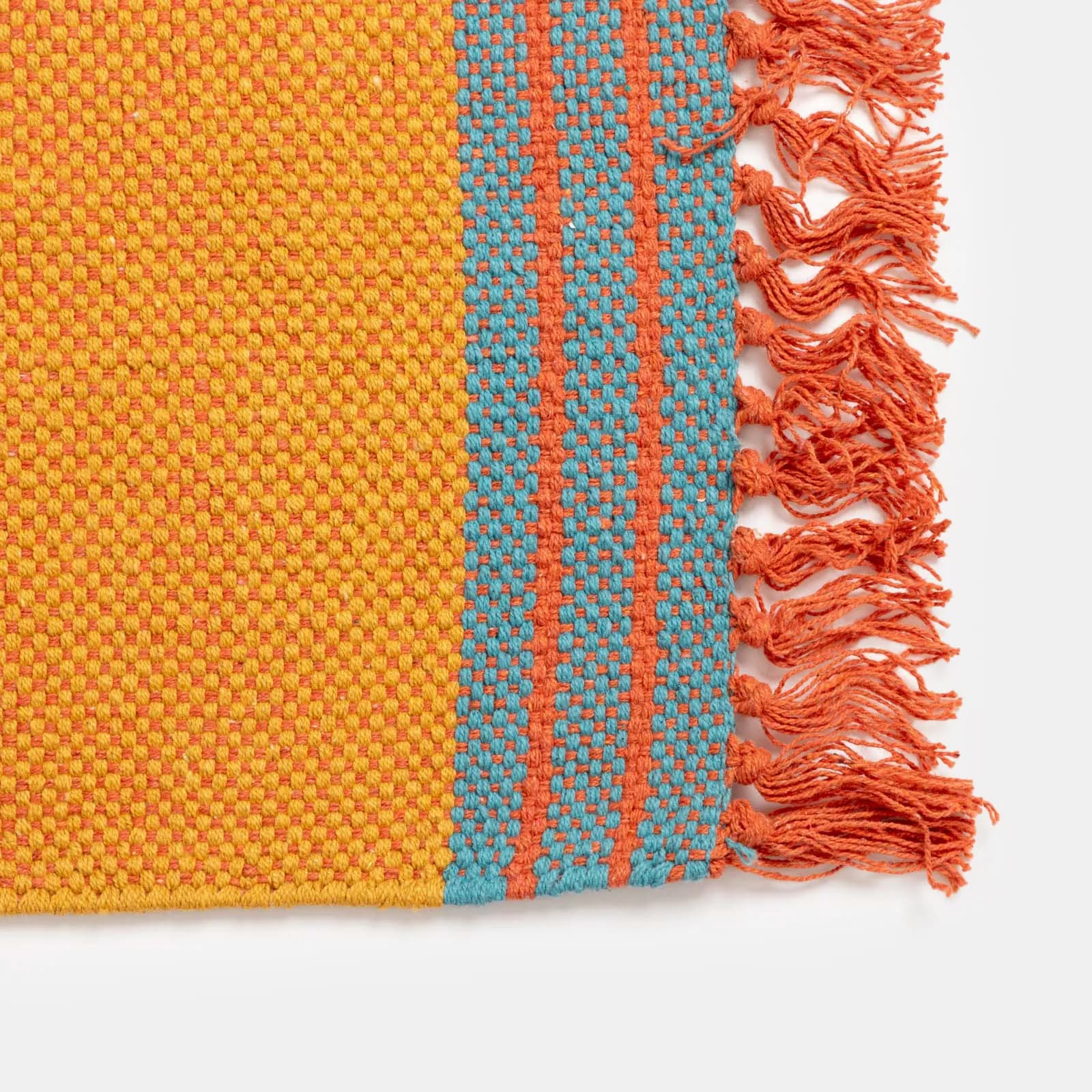 Tappeto 60x90 cm in cotone senape con frange