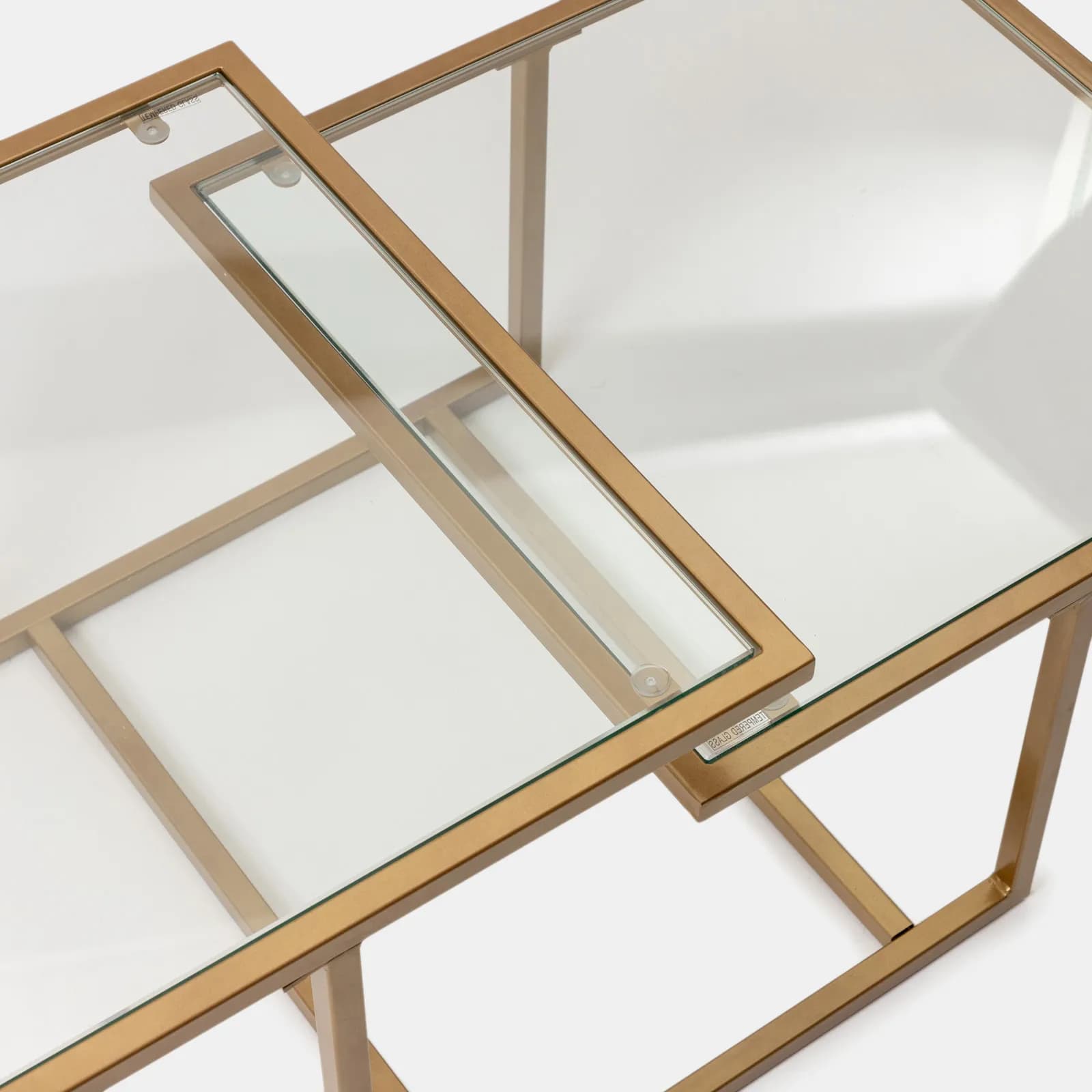 Tavolino 110x59 cm con 2 top in vetro e struttura in metallo finitura oro - Meyer